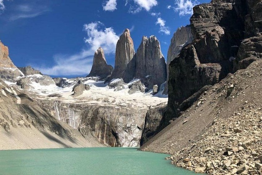A glacier with towering peaks in the background. 5