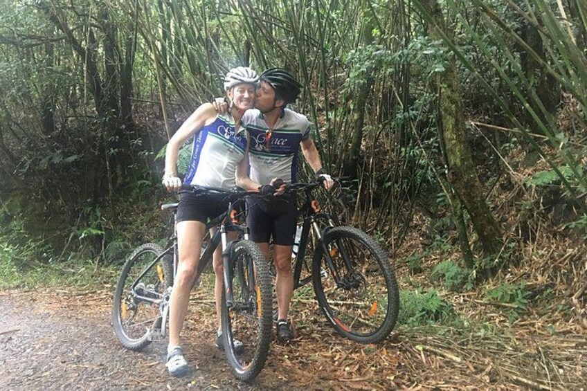 Two cyclists on a forest trail with bicycles. 2