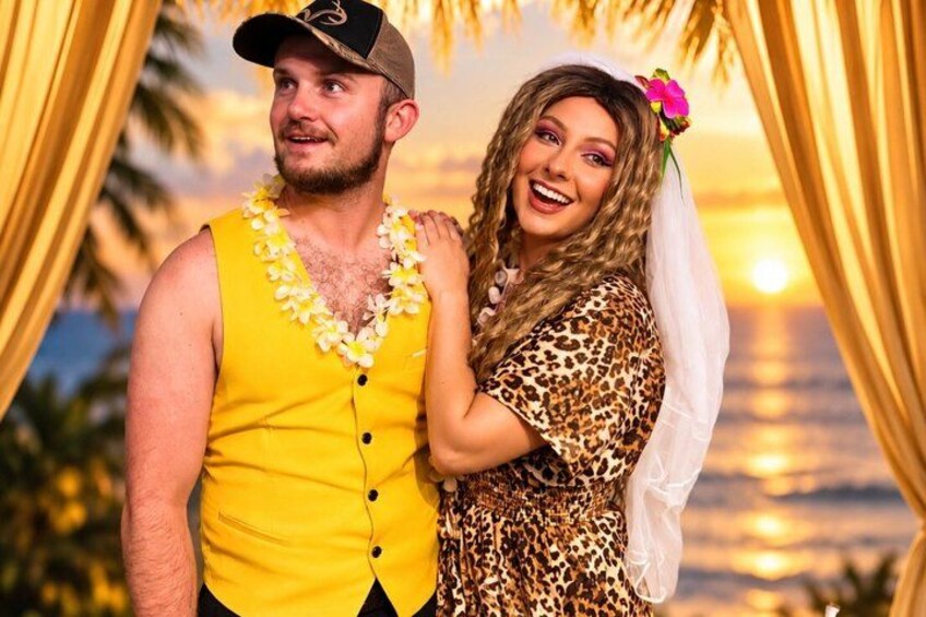 A couple in a tropical setting with a sunset in the background. 2