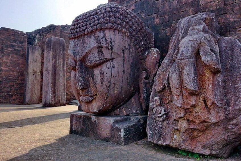 Large stone Buddha statues in a historical site. 3