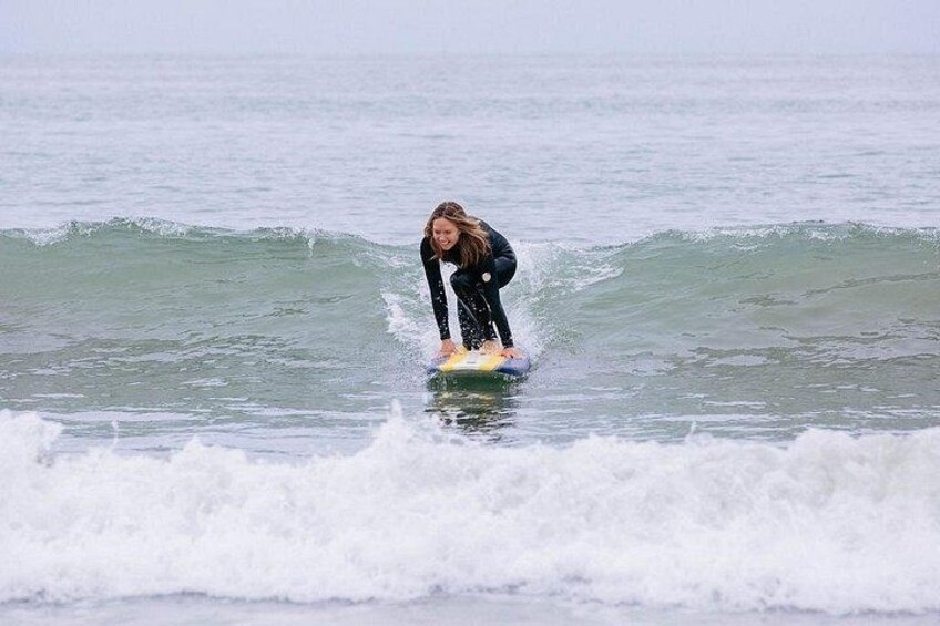 A person surfing on a wave in the ocean. 2