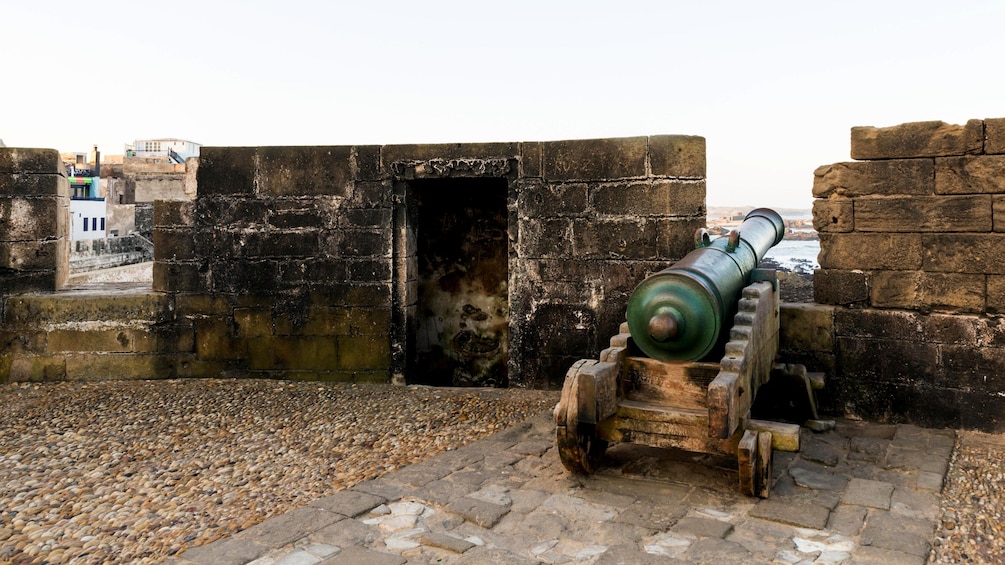 The battlements of a Moroccan castle with an old cannon