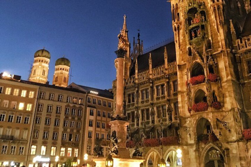 A historic building with ornate architecture and a prominent tower. 1