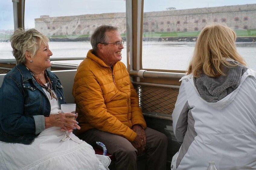 The top deck features clear, roll-down side curtains for comfort. 5