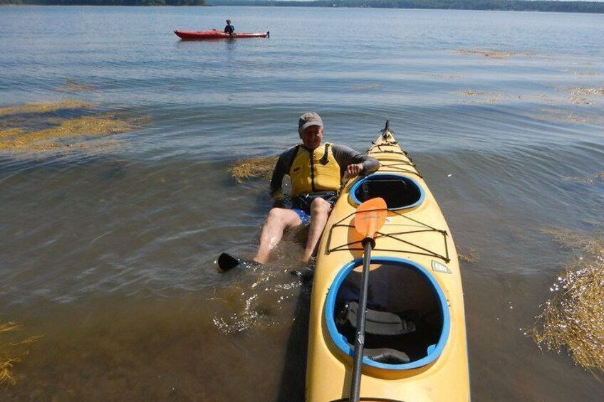 Cooling off close to my sea kayak.