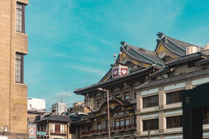 Traditional Japanese architecture with tiled roofs and wooden structures. 3