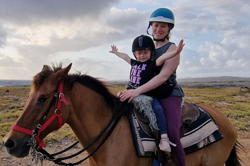 Create unforgettable memories with your little one on our family-friendly horseback ride! Enjoy Aruba’s trails together on a double-seat saddle, 4