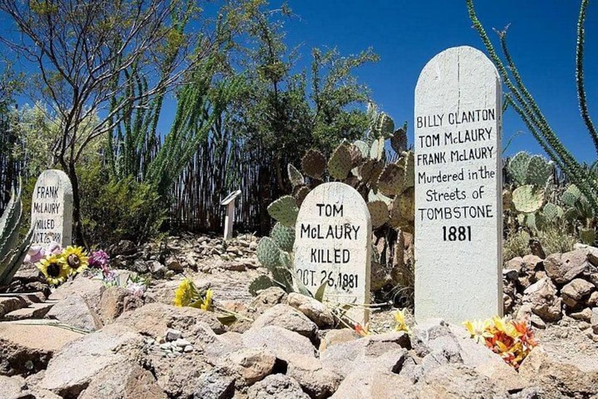A graveyard with headstones, including one for Tom McLaury killed on Oct. 26, 1881. 2