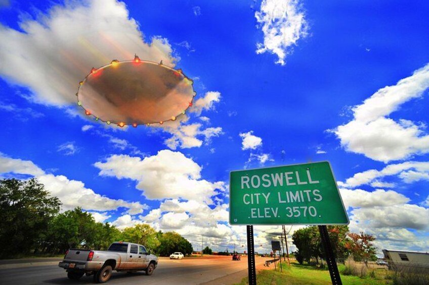 A road sign indicating Roswell city limits with an elevation of 3570. 5