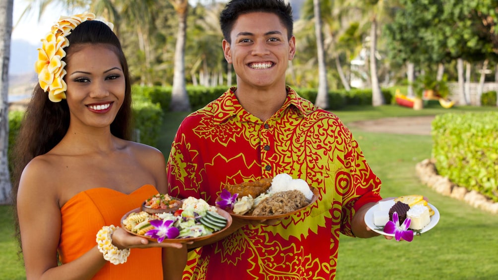 Luau hosts offering tasty food items