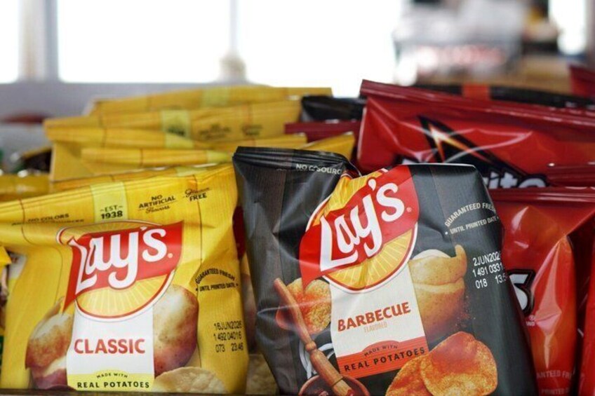 Bags of Lay's potato chips, including Classic and Barbecue flavors. 3