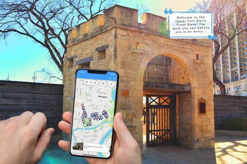 A smartphone displaying a map with a location pin, an archway, and a sign with a welcome message. 1