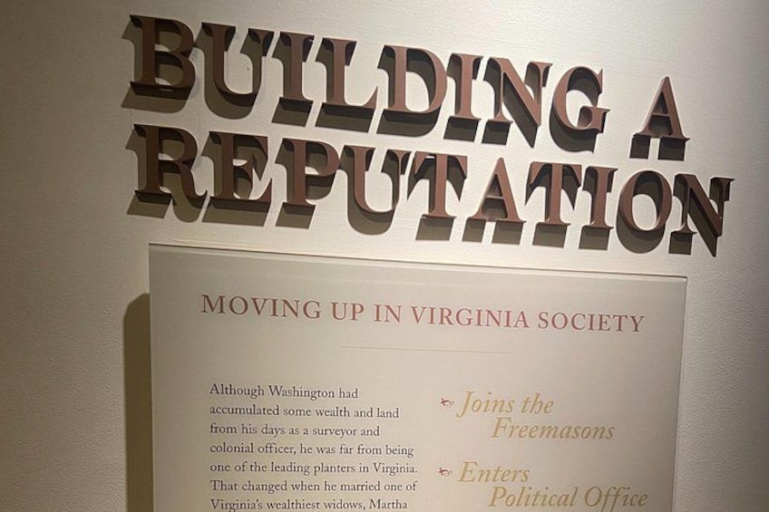 A sign with the title 'BUILDING A REPUTATION' and text about Virginia society. 4