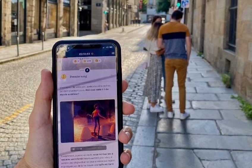 A smartphone displaying a news article with a photo of a person in a red outfit. 3