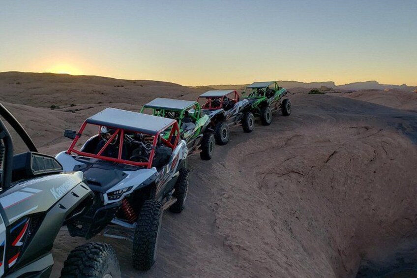 Off-road vehicles on a desert trail. 3