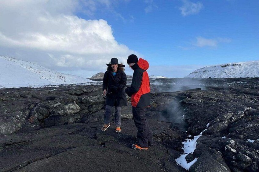 A family over the lava field at Fagradalsfjall Volcano 2