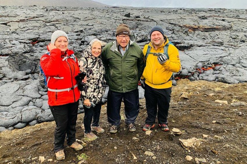 Gudni our guide with happy guests at the lava field. 2
