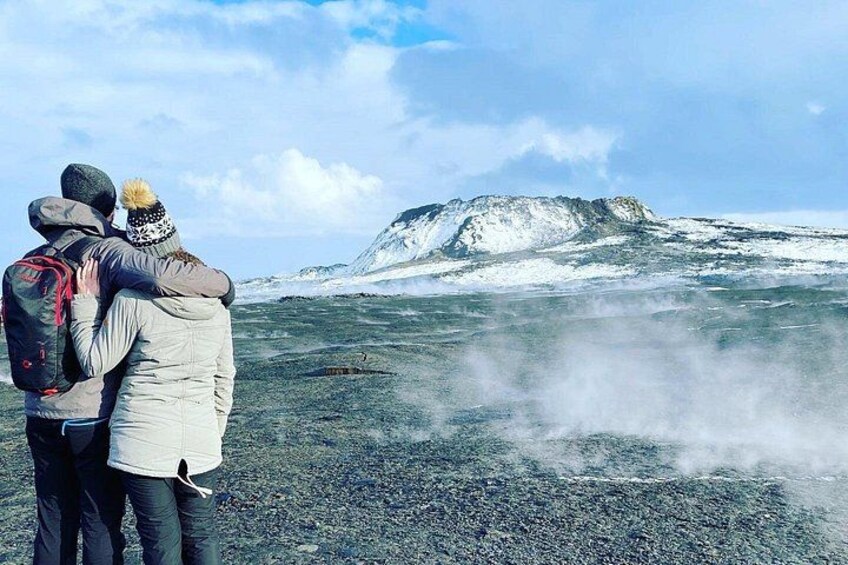 Guests posing nearby the crater at Fagradalsfjall Volcano in Iceland 2