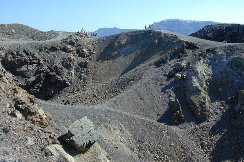 A rugged mountainous landscape with rocky terrain and a winding path. 4