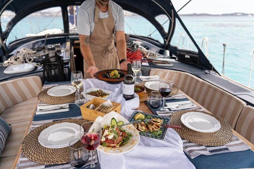 Setting the table while you are enjoying the sea.