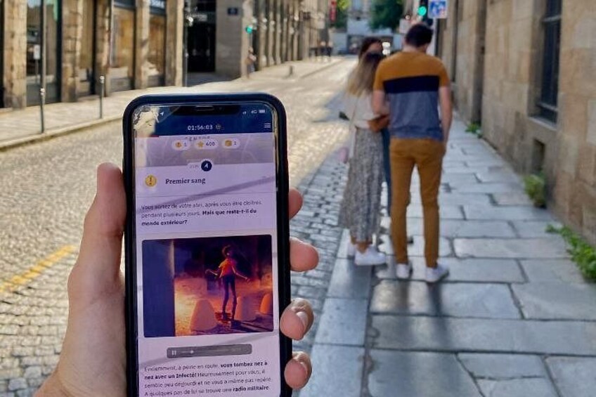 A smartphone displaying a news article with a photo of a person in a red outfit. 3