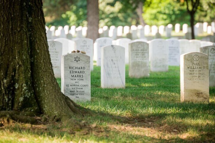 A cemetery with headstones, including one for Richard Edward Marks. 3