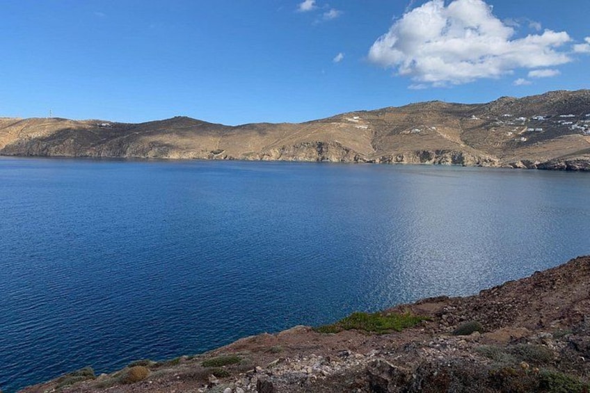A calm lake surrounded by hills. 2