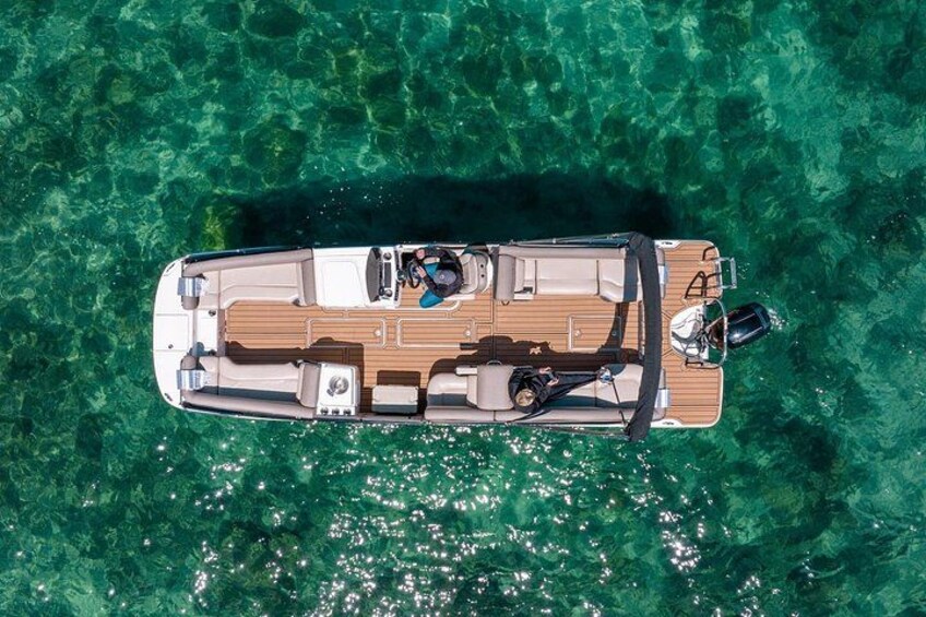 A boat on clear turquoise water. 4