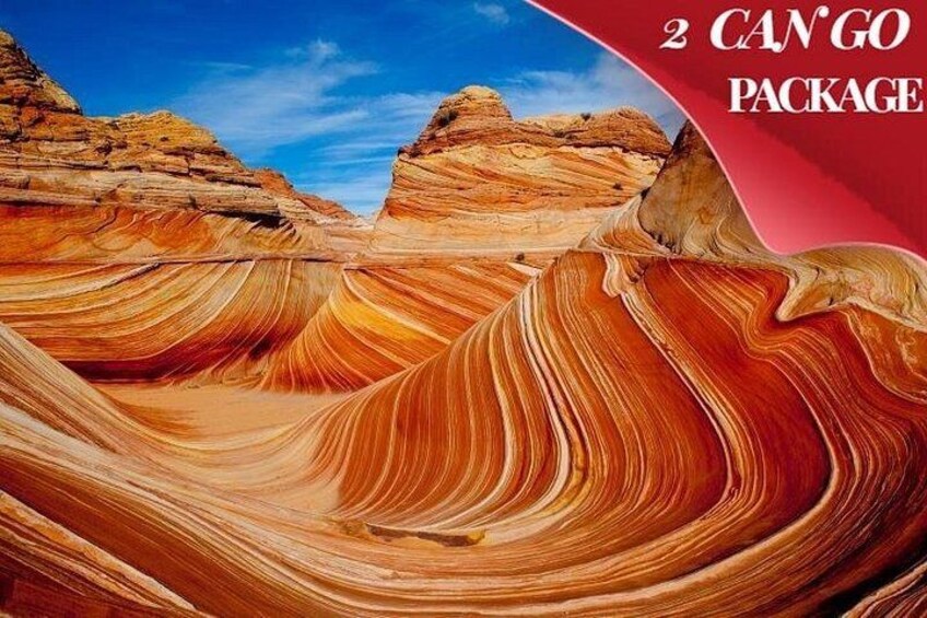 Un canyon aux formations rocheuses stratifiées, sous un ciel bleu et dégagé. 4
