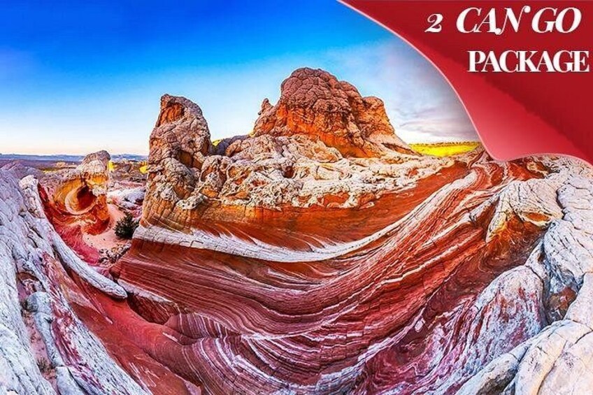 Un paysage de canyon caractérisé par des formations rocheuses en strates et un ciel dégagé. 5