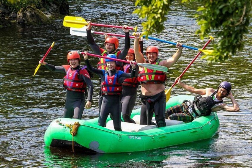 Warm day for rafting on the River Dee, Guides approve. 5