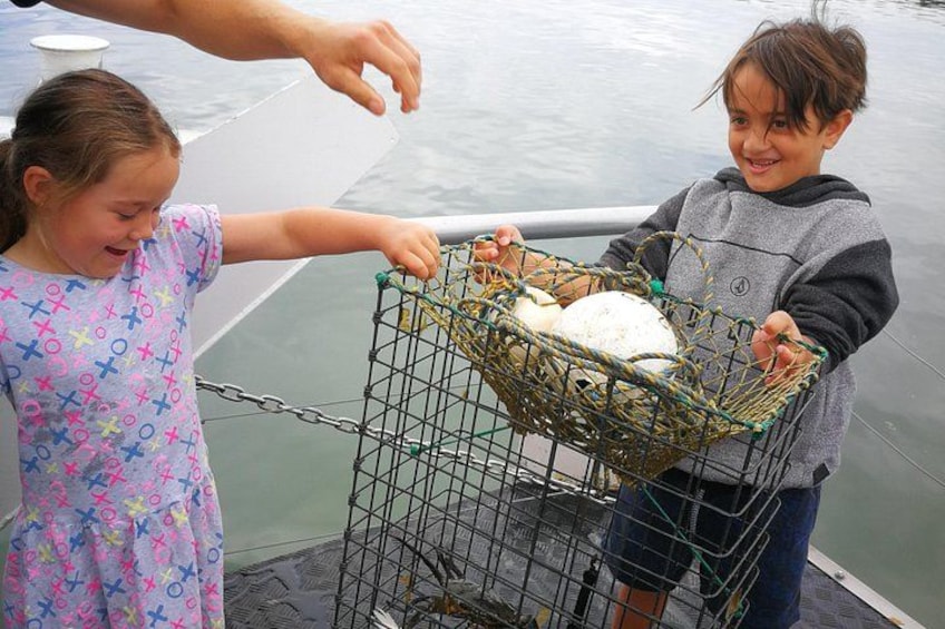 It takes more then two little hands to pull up these crab pots! 4