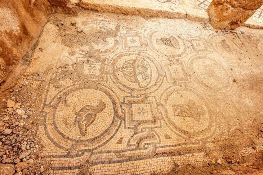 An ancient mosaic floor with geometric patterns. 3
