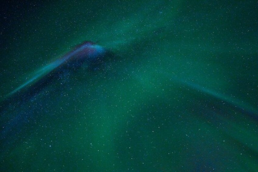 A starry night sky with a visible aurora. 3