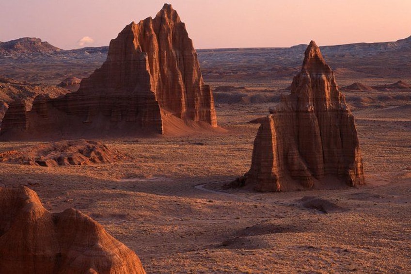 A desert landscape with prominent rock formations. 5