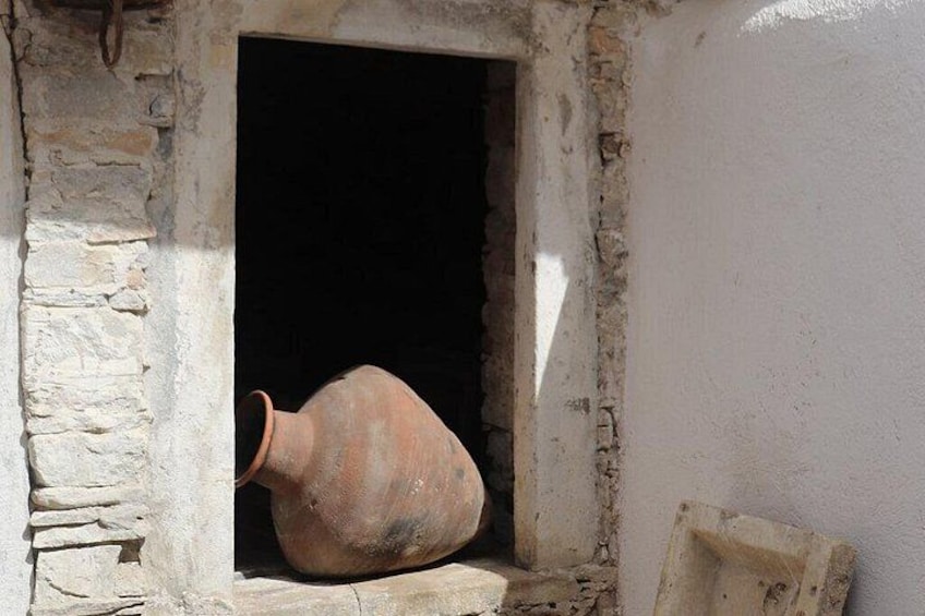 A rustic stone wall with a window. 3