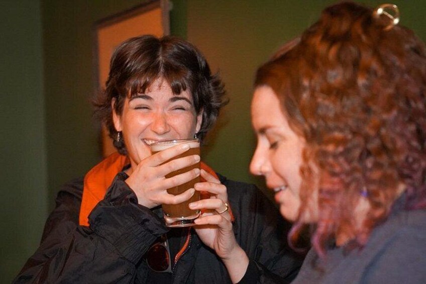 Two people holding a glass. 2