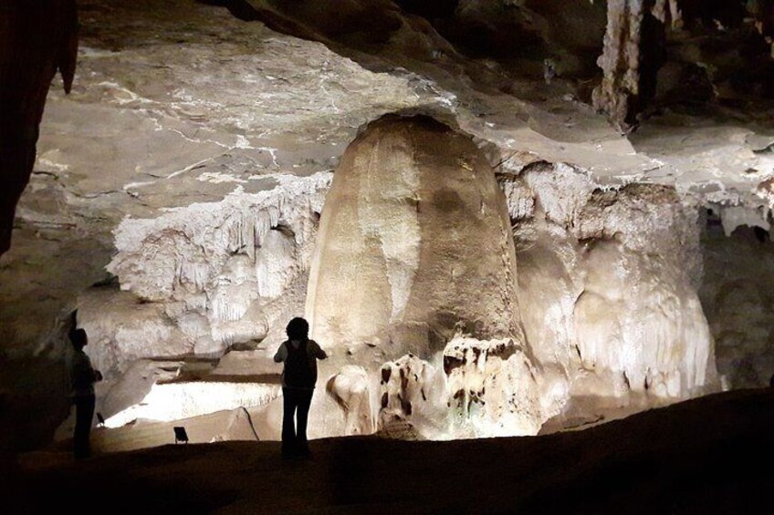 A cave with stalactites and stalagmites. 3