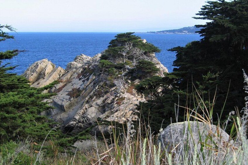 Uplifted granite formations jut out into Carmel Bay where you have a clear view of Pebble Beach across the water. 2