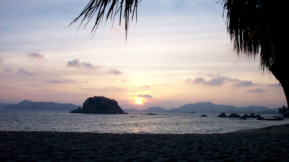 Beautiful view of the ocean at sunset from the beach in Mexico