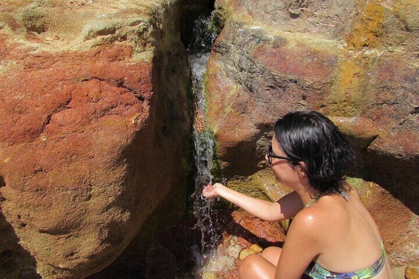Multi-colored cave with an invigorating bath. 1