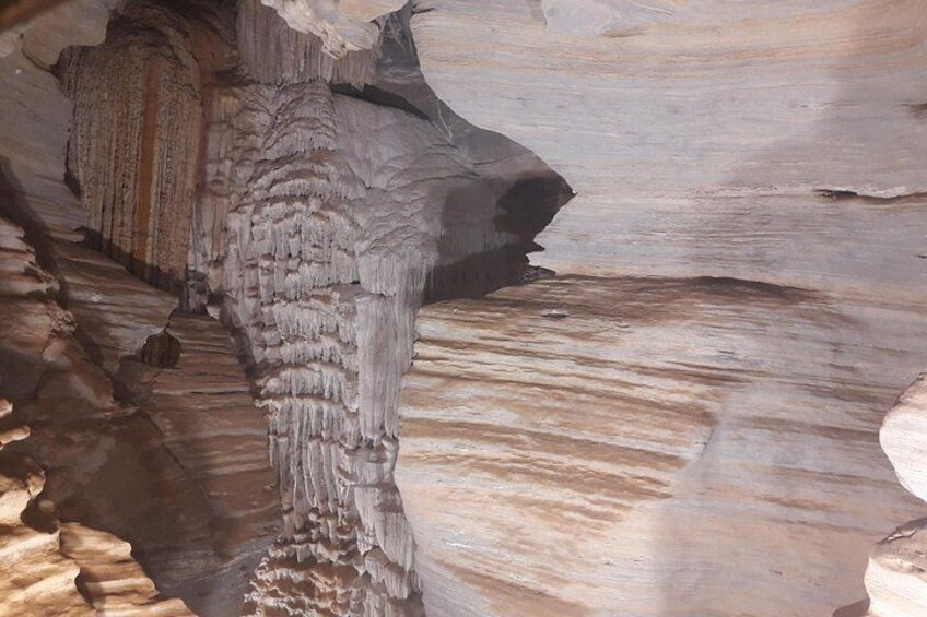 A cave with stalactites and stalagmites. 5