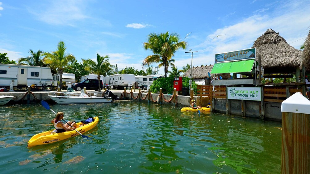 Kayakers paddle up to paddle hut in Florida Keys