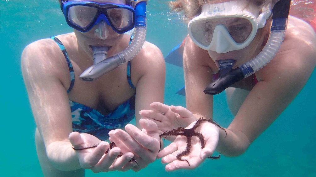 Two ladies Snorkeling in San Juan