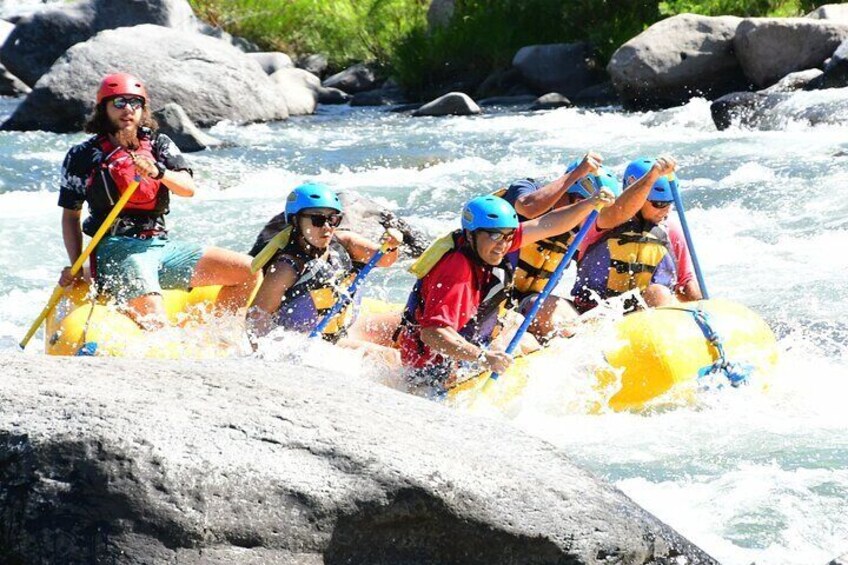 A group of people rafting on a river. 3