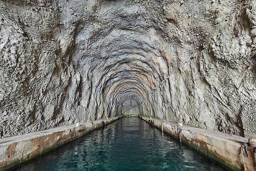 A tunnel with water running through it. 4