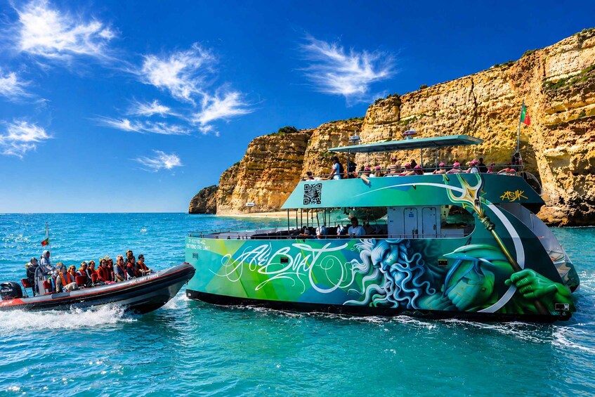 A boat with graffiti and a rocky cliff in the background. 1