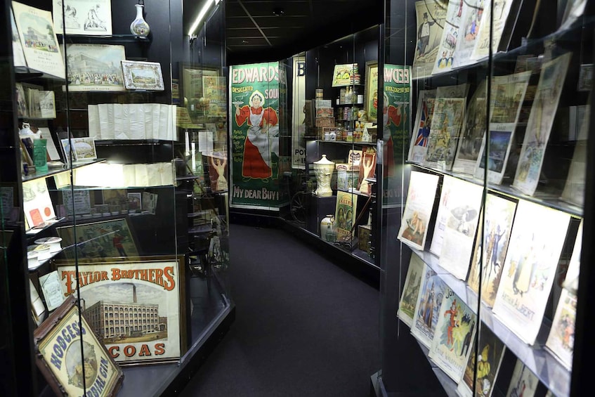 A museum exhibit with vintage posters and memorabilia. 5