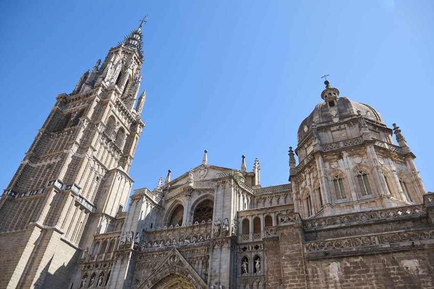 A Gothic cathedral with intricate stonework and two prominent towers. 5