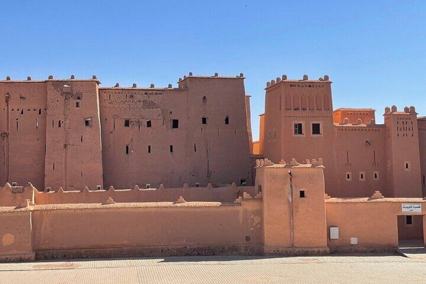 A large, fortified structure with multiple towers and walls, likely a historical or cultural landmark. 3